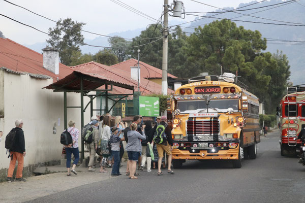 At last after a 11.5h drive through winding mountain roads we arrive in Panajachel at the Lake of Atitlan - Here a typical souped up US school bus 