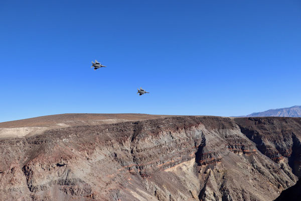 ...believe it or not but that moment came as we arrived and looked down Death Valley only to see two US Jet Fighters in low level flight coming right at us!!