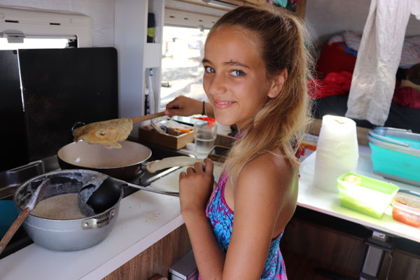 Lynn prepares pan cakes for breakfast...