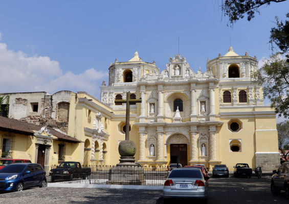 An important architectural baroque, yellow-white church La Merced in the middle of the city