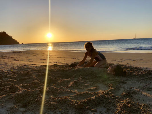 Lynn buried Mum in the sand..