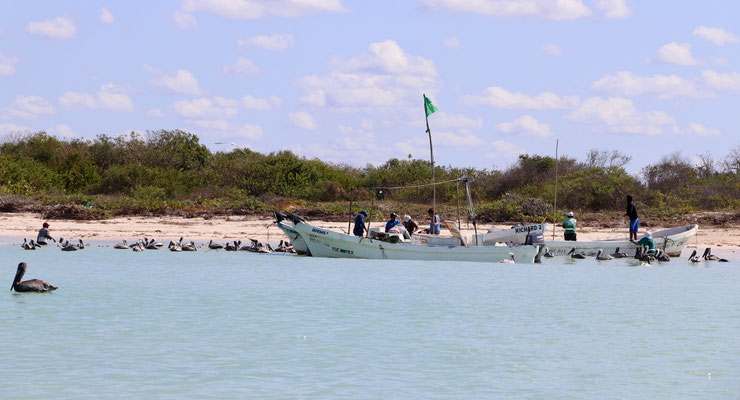..we went past fishermen hauling their nets..