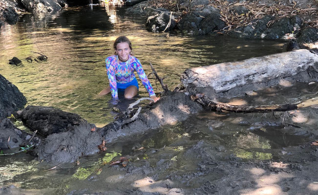 On the way to the rocks we stop at a river to cool off - Lynn is full of energy and builds a dam