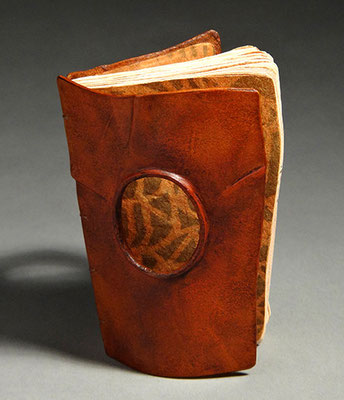 Remembering, Book One (2016) mixed media on lokta and charcoal papers, wet-formed leather covers, unique, 4.25 x 5 x 2.5 inches, Herron School of Art and Design Library