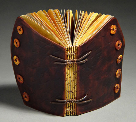 Luck, Book Two (2016) mixed media on handmade and tea chest papers, wet-formed leather covers, unique, 4.75 x 6 x 3 inches, Baylor University Libraries