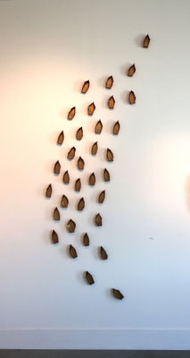 Towards the Other Side of Panic (2020) wet-formed leather boats, acrylic paint, 144 x 48 inches, private collection