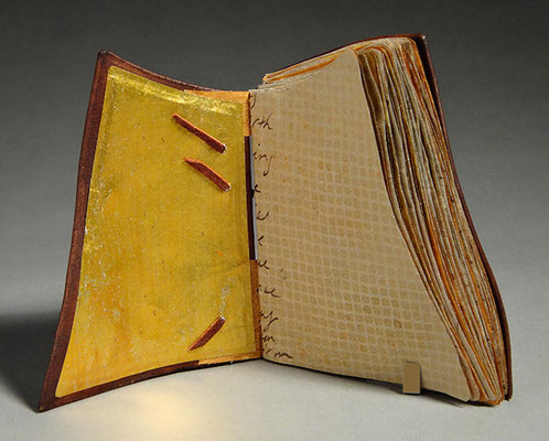 Luck, Book One (2016) mixed media on tea chest paper, wet-formed leather covers, unique, 4.75 x 6 x 3.5 inches