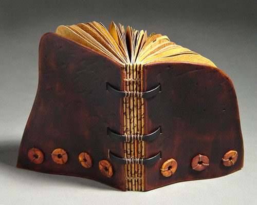 Luck, Book Three (2016) mixed media on handmade and tea chest papers, wet-formed leather covers, unique, 4.5 x 6.5 x 4 inches, Herron School of Art and Design Library