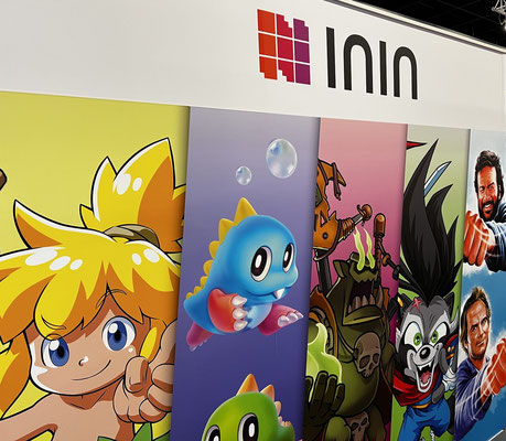 Das Bild zum Interview mit Strictly Limited Games Co-Founder Dennis Mendel vom Männerquatsch Podcast, zeigt ein Artwork von ININ-Games auf der Gamescom 2022.