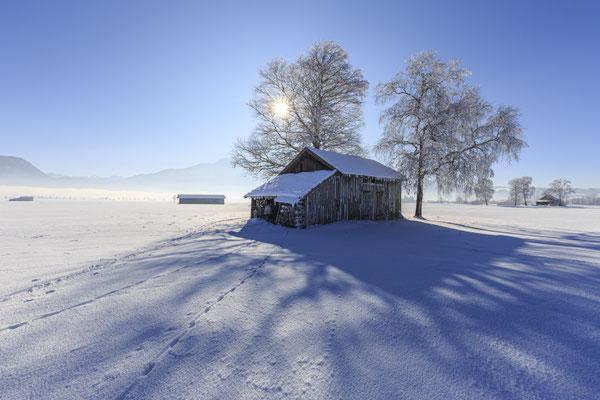 Holzhütte im Winter