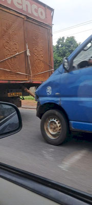 This van was just attached to the truck with a rope, a man was sleeping inside 