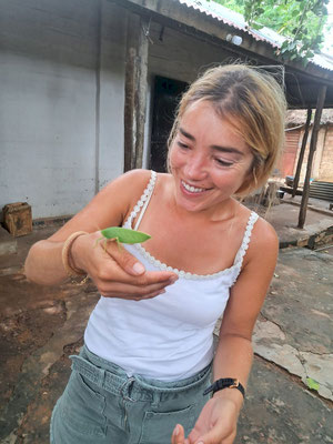 Happy Gabriela with a leaf bug on Jamaican place