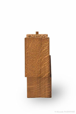 Coffret en chêne teinté et liège.