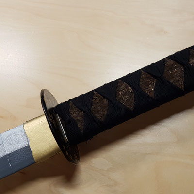 Assembled blade with finished hilt