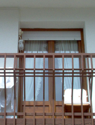Puerta balconera en PVC de Kommerling en color embero