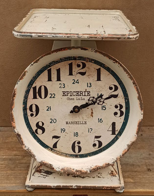 Reloj balanza