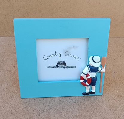 Portafotos marinero resina. Ref PF25. 12,5x12x5