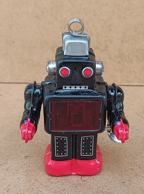 Robot Sparkling (Japón). Ref 1064. 8 cms.  Emite chispas al andar