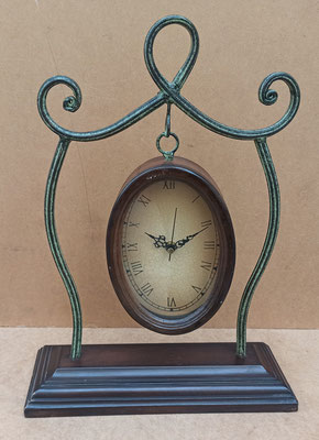 Reloj colgante. 43x32x10