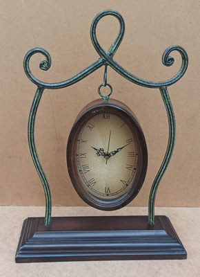Reloj colgante. 43x32x10