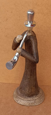 Saxofonista pasta de piedra y metal. Ref 21533. 42x16x15