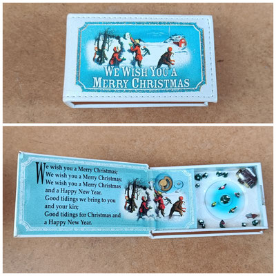 Libro con música y movimiento "We wish you a merry christmas". Ref MR9952. 9x5,5x3 cerrado