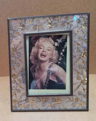 Portafotos meta/tela. Ref 49916. 27x22