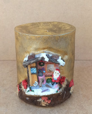 Velón artesanal con Santa Claus en relieve. 15x12