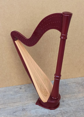 Arpa musical 5 canciones. Ref OG229A. 29x18x7. Funciona con pilas. 