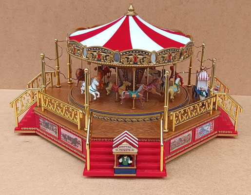 Mr Christmas. Tiovivo musical giratorio con luz. Ref 42366. 36x28x21. 25 canciones clásicas y 25 canciones navideñas.
