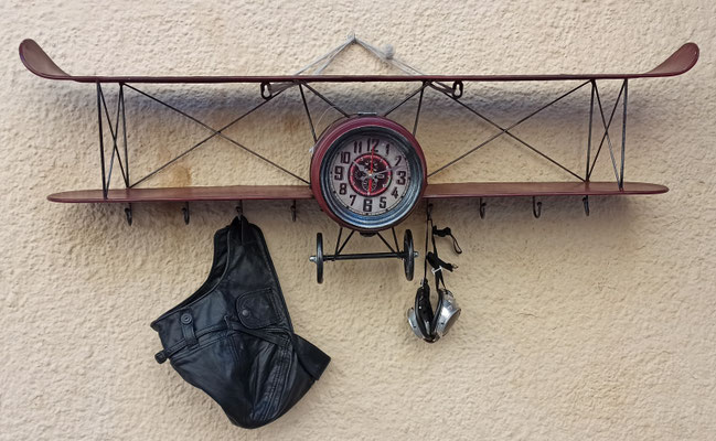 Reloj avión con perchero