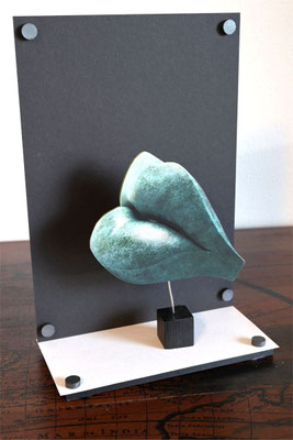 Installation on small board with back plate as sculpture