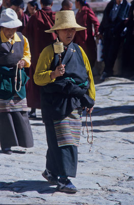 Woman with her praying wheel, Drepung Monastery, Tibet 1993