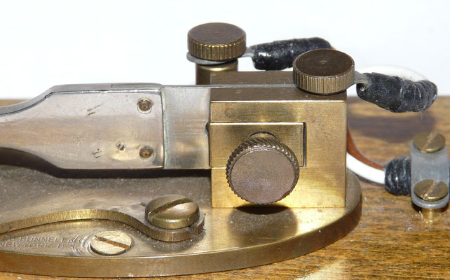 The image shows brass blocks of a "Style W" Double Speed Key adjusted for maximum tension. This lever and spring tension adjustment was patented by Roye M. Wood, November 29, 1904. 