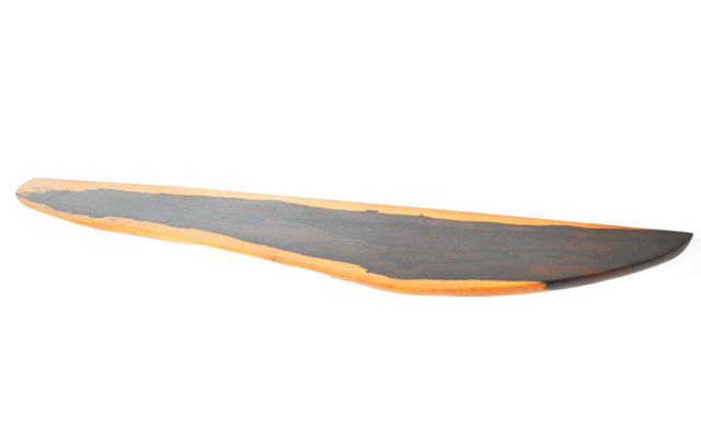 Organic designer shelf W2475 in precious ziricote – a captivating functional sculpture by Jörg Pietschmann, mindfully carved to follow the natural flow of the fiber, bringing the hidden geometry of the forest into sophisticated contemporary spaces.