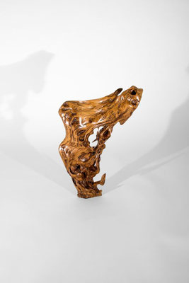 Abstract olive root wood sculpture S0058 by Jörg Pietschmann, featuring a dynamic, highly figured golden-brown grain with intricate natural knots, wild textures, and organic negative space cutouts on a white background.