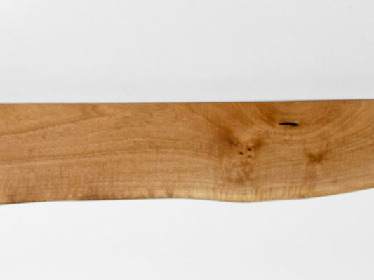 Architectural wall shelf W1254 in massive oak – a powerful functional sculpture by Jörg Pietschmann, sculpted to honor ancient trunks and ground premium interiors with the raw, unwritten history of the woods.
