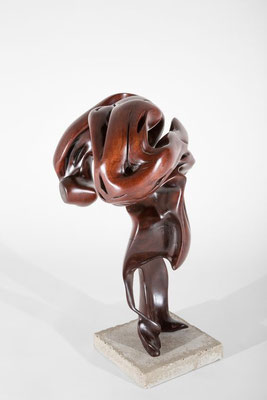 Abstract redwood sculpture S1012 by Jörg Pietschmann, featuring a dynamic biomorphic shape with smooth, dark reddish-brown polished wood curves, loops, and organic hollow cavities, mounted on a square concrete base against a white studio background.
