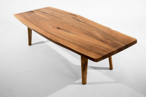 Architectural art table T1191 – a powerful functional sculpture by Jörg Pietschmann, sculpted to honor the deep-grained character of ancient trunks and ground premium interiors with the raw, unwritten history of the woods.