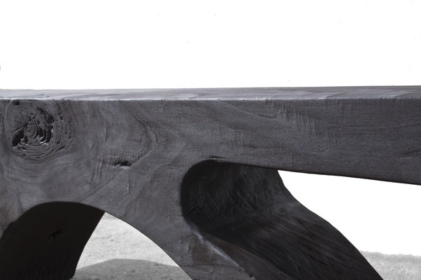 Dynamic sculpture bench B2140 in massive poplar , charred– an extraordinary functional sculpture by Jörg Pietschmann, mindfully carved to elevate the natural flow of the grain and enrich contemporary spaces with the living memory of nature.