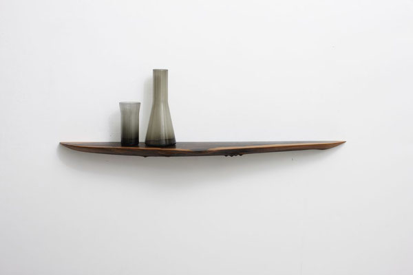Grounding wall console W0187 in characterful ziricote – a singular piece of tactile wall art by Jörg Pietschmann, meticulously crafted to preserve organic history and invite the quiet breath of ancient woods.