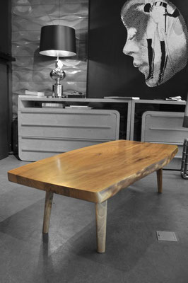 Architectural art table T1191 – a powerful functional sculpture by Jörg Pietschmann, sculpted to honor the deep-grained character of ancient trunks and ground premium interiors with the raw, unwritten history of the woods.