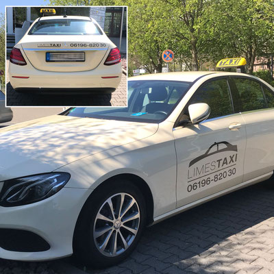 Taxi mit individuell gestalteter und geplotteter Folienbeschriftung des Logos