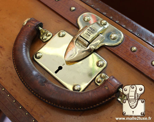 Louis Vuitton lozine suitcase with Louis Vuitton letter B lock