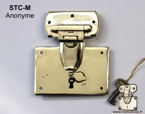Serrure STC-M anonyme en laiton massif d'origine.