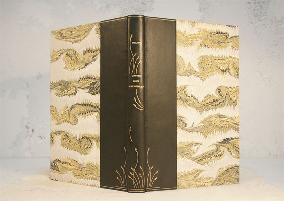 reliure 1/2 peau chagrin, décors à la feuille d'or ( création aux fers courbes)