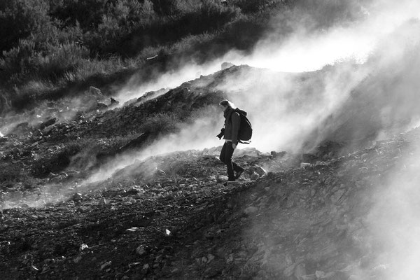 Black and white photo by Delphicaphoto descending from the mountain in the fog