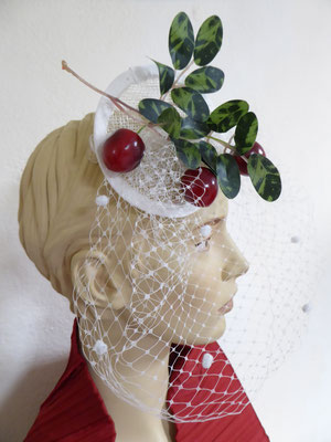 White sinamay base with white tulle and vintage cherry sprig €59