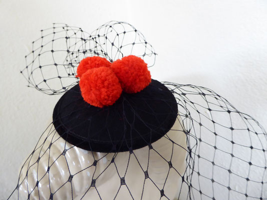 Black Forest with red pom poms....... €59