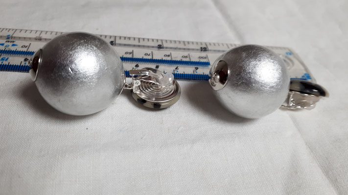 Large silver globes with torty bouton clips, €89. Lightweight